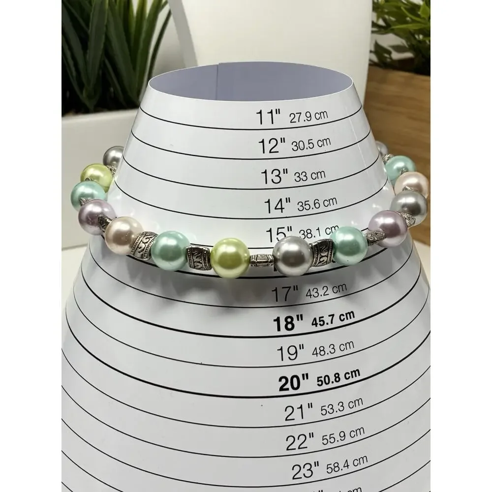 Pastel Faux pearl necklace with antiqued Silver Tone metal spacer beads.